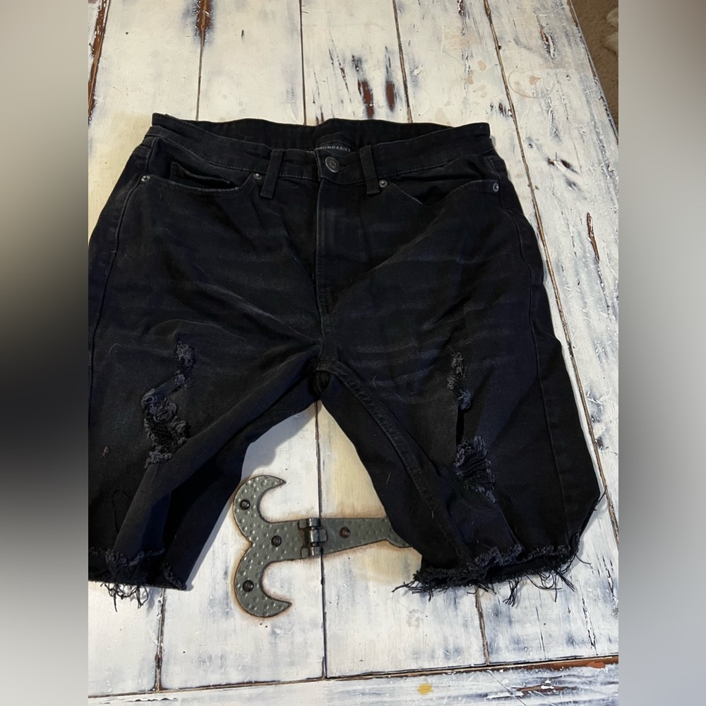 Black ripped shorts
